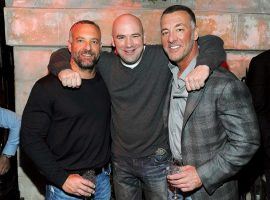 Lorenzo (left) and Frank Fertitta III (right), seen here with UFC President Dana White, are much richer this week after selling the company they bought for $2 million for $4 billion. (Image: Jamie McCarthy/WireImage)