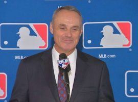 MLB Commissioner Rob Manfred said in an interview Wednesday that he is opening to revisit the topic of gambling and believes sports betting should be regulated.