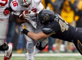 Ohio State's J.T. Barrett had a rough game against Iowa last weekend throwing for four interceptions in the 55-24 loss. (Image: AP)