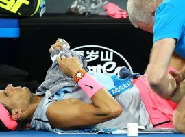 Rafael Nadal received medical attention during his Australian Open quarterfinal match with Marin Cilic. He was forced to retire and it was yet another ranked player who is out of the event. (Image: Getty Images)