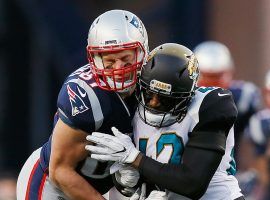 New England tight end Rob Gronkowski suffered a concussion after this helmet-to-helmet hit by Jacksonville linebacker Barry Church and is questionable to play in Sunday’s Super Bowl. (Image: Getty)
