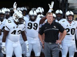 UCF made both departing coach Scott Frost and bettors happy when the defeated the heavily favored Auburn Tigers in the Peach Bowl on Jan. 1. (Image: Orlando Sentinel)