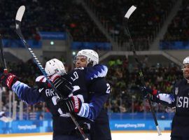 The United States kept their medal hopes alive in men’s Olympic hockey by defeating Slovakia 5-1 to reach the tournament quarterfinals. (Image: SI.com)
