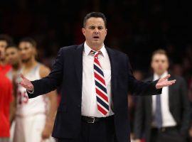 Arizona Coach Sean Miller did not coach at Oregon on Saturday after it was reported he was on an FBI wiretap discussing a $100,000 payment regarding one of his players. (Image: Getty)