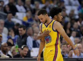 Stephen Curry tweaked his right ankle in the first quarter of the Warriors game against the Spurs, and will sit out the team’s upcoming road trip. (Image: Carlos Avila Gonzalez/San Francisco Chronicle)