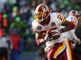 Clinton Portis will be required to pay a portion of his earnings through 2021 to the Borgata Casino in order to cover a $190,000 debt. (Image: AP/John Froschauer)