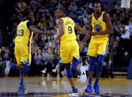 The Warriors will be without Steph Curry for the first round of the NBA playoffs, putting more pressure on Draymond Green, Andre Iguodala, and Kevin Durant, among others. (Image: Carlos Avila Gonzalez/The Chronicle)