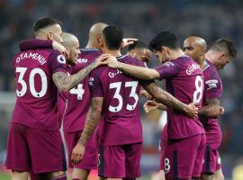 Manchester City celebrates after a victory over Tottenham Saturday, which set the stage for them to clinch the EPL title when Manchester United lost on Sunday. (Image: AP)
