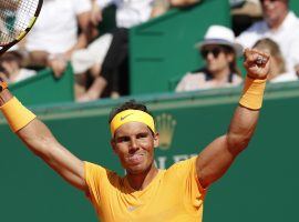 Rafael Nadal celebrates his 11th career Monte Carlo Masters title after defeating Ken Nishikori 6-3, 6-2 on Sunday. (Image: Chistope Ena/AP)