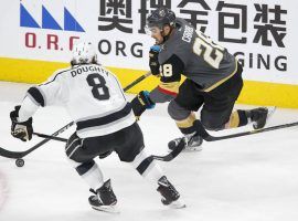 Drew Doughty prepares to deliver a check to William Carrier that was ruled an illegal hit to the head. (Image: Las Vegas Review-Journal)