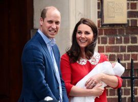 Prince William and Kate Middleton exit the hospital after the birth of their third child. (Image: Getty)