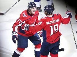 T.J. Oshie (77) and Nicklas Backstrom (19) celebrate Oshie’s second-period goal during the Capitals 3-0 win over the Tampa Bay Lightning in Game 6 of the 2017 Eastern Conference finals. (Image: Amber Searls/USA TODAY Sports)