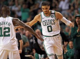 Jayson Tatum (0) celebrates with Terry Rozier (12) after making a 3-pointer during Game 5 of the Boston Celtics Game 5 win over the Cleveland Cavaliers in the 2018 Eastern Conference finals. (Image: Matt Store/Boston Herald)