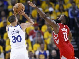 Stephen Curry of the Golden State Warriors shoots over Houston Rockets guard James Harden during Golden State’s Game 3 victory in the Western Conference finals. (Image: Michael Ciaglo/Houston Chronicle)