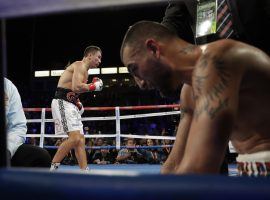 Gennady Golovkin celebrates after knocking out Vanes Martirosyan on Saturday. GGG made his 20th consecutive middleweight title defense, tying a division record. (Image: Chris Carlson/AP)