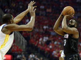 Rockets guard James Harden shoots over the Warriors’ Kevin Durant during Houston’s 127-105 victory on Wednesday. (Image: Thomas B. Shea/USA TODAY Sports)