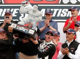 Kevin Harvick celebrates with the Miles the Monster trophy after winning the 2018 AAA 400 Drive for Autism at Dover International Speedway. (Image: Getty)