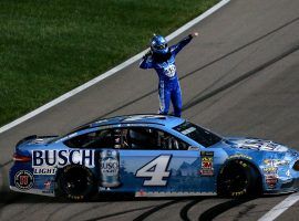 Kevin Harvick celebrates after winning the KC Masterpiece 400 on at the Kansas Speedway on Saturday night. (Image: Sean Gardner/Getty)