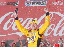 Kyle Busch celebrates after winning the Coca-Cola 600, his first ever victory at Charlotte Motor Speedway. (Image:  Brian Lawdermilk/Getty)