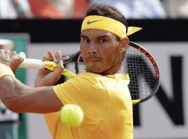 Rafael Nadal returns a ball in his victory over Alexander Zverev during the final of the Italian Open in Rome. Nadal is heavily favored to win the French Open. (Image: AP)