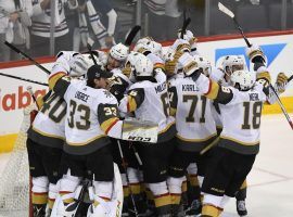 The Vegas Golden Knights celebrate after defeating the Winnipeg Jets 2-1 in Game 5 to clinch the Western Conference finals. (Image: David Lipnowski/Getty)