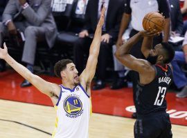 Rockets guard James Harden shoots over the Warriors’ Klay Thompson. Houston missed 27 straight 3-pointers during their loss to Golden State in Game 7 of the Western Conference finals. (Image: Getty)