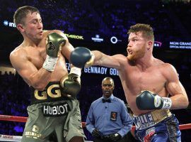 Gennady Golovkin (left) and Canelo Alvarez (right) fought to a draw in a September 2017 fight. Talks for a rematch now appear to be off until 2019. (Image: John Gurzinski/AFP/Getty)