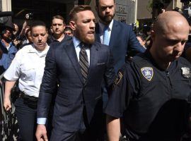 Conor McGregor leaves Kings County Supreme Courthouse in Brooklyn Thursday after a hearing related to his attack on a bus at the Barclays Center before UFC 223. (Image: Timothy a. Clary/AFP/Getty)