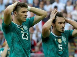 Germany’s Mario Gomez (#23) and Mats Hummels (#5) look on in shock during their team’s 2-0 defeat to South Korea at the 2018 World Cup. (Image: Getty)