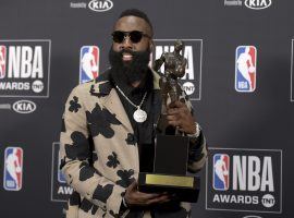 Houston Rockets guard James Harden poses with the MVP award at the NBA Awards on Monday night. (Image: Richard Shotwell/Invision/AP)