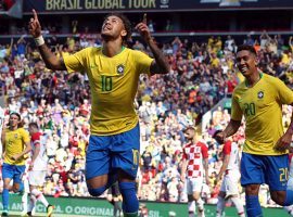 Neymar (10) celebrates after scoring a goal for Brazil in a 2-0 friendly win over Croatia on Sunday in Liverpool, England. (Image: Mark Leech/Offside)