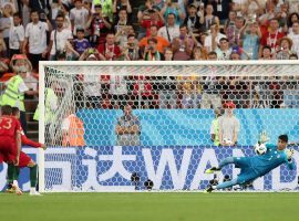 Iranian goalkeeper Alireza Beiranvand saves a penalty kick from Cristiano Ronaldo during the 1-1 draw between Portugal and Iran at the 2018 FIFA World Cup. (Image: Reuters)