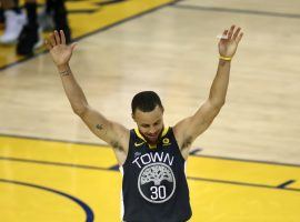 Stephen Curry celebrates during Game 2 of the 2018 NBA Finals. Curry made nine 3-pointers in the game, setting an NBA Finals record. (Image: AP/Ben Margot)