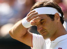 Roger Federer was stunned to lose to Kevin Anderson after leading by two sets in their quarterfinal match at the 2018 Wimbledon tennis tournament. (Image: Oli Scarff/AFP/Getty)