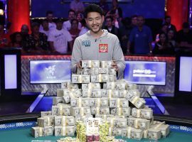 John Cynn poses with his prize money after winning the 2018 World Series of Poker Main Event. (Image: AP/John Locher)