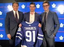 John Tavares shows off his new jersey after signing a seven-year contract with the Toronto Maple Leafs. (Image: Toronto Maple Leafs)