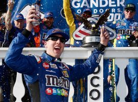 Kyle Busch celebrates after winning the Gander Outdoors 400 at Pocono Raceway on Sunday. (Image: Jeff Zelevansky/Getty)