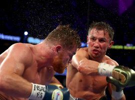 Gennady Golovkin connects on a punch to Canelo Alvarez in their first fight last September. (Image: Getty)