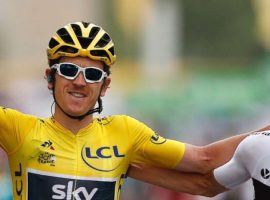 Tour de France winner Geraint Thomas, left, rides into the Champs-Elysees with teammate and four time tour winner, Chris Froome on Sunday. (Image: AP)