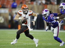 Cleveland Browns rookie quarterback Baker Mayfield eludes tacklers during a preseason game against the Buffalo Bills during the 2018 preseason. (Image: Joe Robbins/Getty)