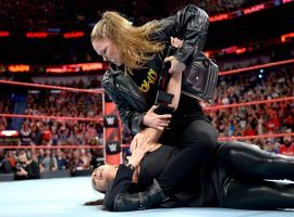 Ronda Rousey has brought some of her MMA moves over to WWE, including her signature armbar – seen here being applied to Stephanie McMahon. (Image: WWE)