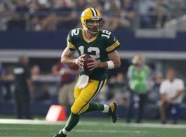 Green Bay’s Aaron Rodgers has signed a contract extension that makes him the highest paid player in the NFL. (Image: USA Today Sports)