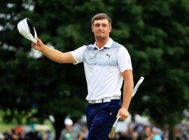 Bryson DeChambeau acknowledges the crowd after winning The Northern Trust on Sunday. (Image: Getty)