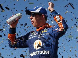 Brad Keselowski celebrates after winning the South Point 400, claiming his third straight NASCAR Cup Series victory and clinching advancement to the second round of the playoffs. (Image: Getty)