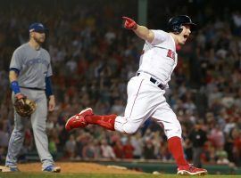 Brock Holt celebrates after hitting a home run in the seventh inning of the Boston Red Sox 7-2 victory over the Toronto Blue Jays on Tuesday. (Image: Jim Davis/Boston Globe)