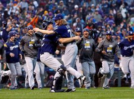 Milwaukee Brewers catcher Erik Kratz (15) and pitcher Josh Hader (71) celebrate after the final out of Milwaukee’s 6-0 win over the Colorado Rockies on Sunday. (Image: Russell Lansford/USA Today Sports)