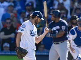 Clayton Kershaw celebrates after striking out Jesus Aguilar to get out of a bases loaded jam in the third inning of Game 5 of the 2018 NLCS. (Image: Gina Ferazzi/Los Angeles Times)