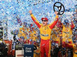 Joey Logano used a bump-and-run maneuver to move past Martin Truex Jr. and win the First Data 500, clinching a spot in the final NASCAR playoff round. (Image: Brian Lawdermilk/Getty)
