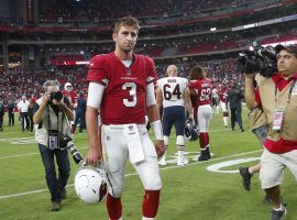 Arizona rookie quarterback Josh Rosen walks off the field after another loss. The team is considered one of the worst in the NFL. (Image: USA Today Sports)