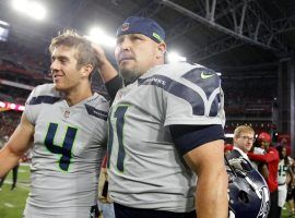 Michael Dickson, left, is congratulated after the game after his fake punt allowed Seattle to run out the clock and defeat Detroit. (Image: AFP)